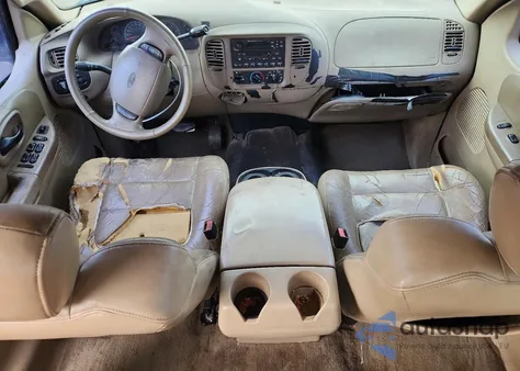 2001 Ford F150 Supercrew z USA, uszkodzony, nr VIN 1FTRW07L41KB36014